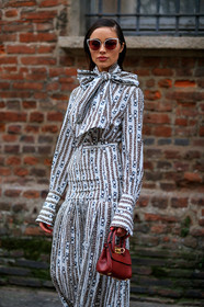 bow, graphic dress, graphic skirt, leather bag, pleats, printed dress, printed skirt, red bag, salvatore ferragamo, sunglasses, white shirt, white skirt, MILAN, MFW, fashion week, frenchystyle, FW, jonathan paciullo, street style, AUTUMN WINTER 2019-2020, AW 19-20, FALL WINTER 2019-2020, FW 19-20, vertical, atmosphere details, detail