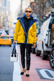 black and white bag, black mules, black pants, black shoes, black sweater, chanel, earrings, graphic bag, high heels, hoodie, leather bag, leather pants, leather shoes, printed bag, sunglasses, trousers, yellow jacket, street style, jonathan paciullo, FW, frenchystyle, fashion week, NYFW, NEW YORK, AUTUMN WINTER 2018-2019, AW 18-19, FALL WINTER 2018-2019, FW 18-19, vertical, full length, vanessa hong