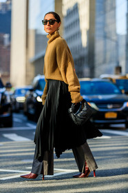 geraldine boublil, bottega veneta bag, beige pullover, turtleneck pullover, pleated skirt, black skirt, asymetrical skirt, long skirt, burgundy leather boots, squared toed shoes, plaited leather bag, plaited bag, hand bag, high heels boots, grey pants, split pants, flare pants, oversize pullover, fashion week, frenchystyle, FW, jonathan paciullo, street style, FALL WINTER 2020-2021, AUTUMN WINTER 2020-2021, FW 20-21, vertical, full length, NYFW, NEW YORK