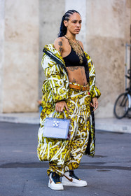 bag, belt, black bra, bra, camel belt, coat, freckles, gold necklace, Hera Pradel, leather belt, long coat, long puffer, necklace, nike sneakers, print, printed coat, printed pants, printed puffer, puffer, sneakers, statement necklace, tattoo, transparent bag, white sneakers, yellow coat, yellow pants, fashion week, frenchystyle, FW, jonathan paciullo, street style, PFW, PARIS, SPRING SUMMER 2022, SS 22, vertical, full length