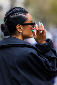 Amina Muaddi, back, black coat, braid, bun, coat, green nails, hairstyle, nailsart, ring, street style, jonathan paciullo, FW, frenchystyle, fashion week, PFW, PARIS, SPRING SUMMER 2022, SS 22, vertical, atmosphere details