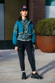 sportswear, black cap, logo print cap, blue jacket, waterproof jacket, eye make up, make up details, strars make up, orange eyeshadow, black eyeliner, plastic earrings, flowers earrings, blue earrings, red earring, house of holland pants, black pants, animal print coat, animal print jacket, animal print top, multicolor top, blue top, yellow top, denim cap, black sneackers, big sole sneakers, fashion week, frenchystyle, FW, jonathan paciullo, street style, vertical, full length