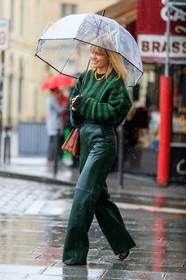 jeanette madsen, sheer umbrella, dark green leather pants, dark green pullover, green pullover, striped pullover, high waist pants, camel leather bag, golden necklace, big chain necklace, fashion week, frenchystyle, FW, jonathan paciullo, street style, PFW, PARIS, vertical, full length