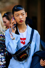 black bag, blue jacket, chains, fanny pack, graphic bag, iphone, leather bag, levi's, levi's strauss, printed bag, wet hair, white t shirt, MILAN, MFW, fashion week, frenchystyle, FW, jonathan paciullo, street style, AUTUMN WINTER 2019-2020, AW 19-20, FALL WINTER 2019-2020, FW 19-20, vertical, atmosphere details, detail