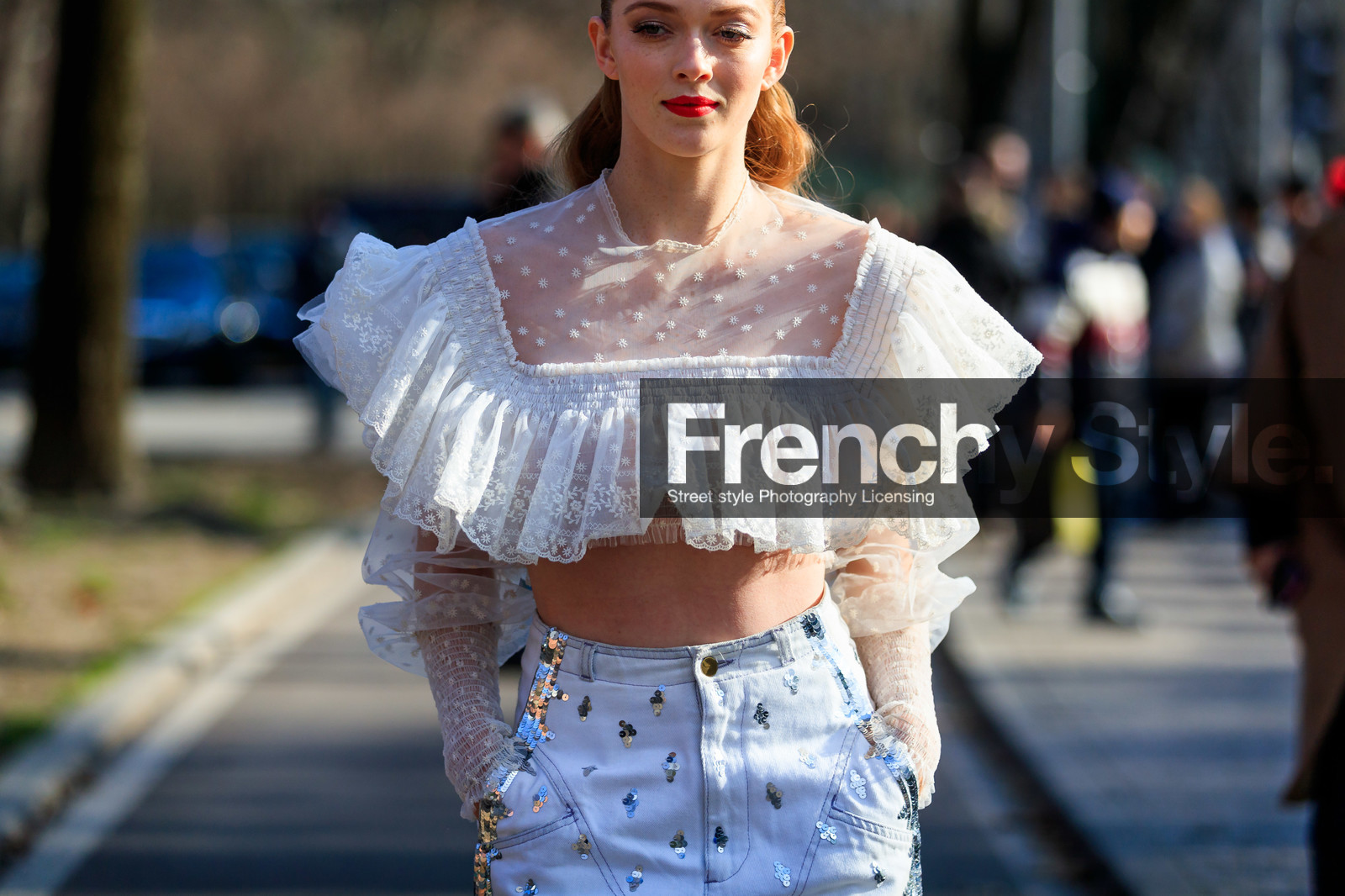 crop top, denim pants, embroidered jeans, glitter, graphic pants, jeans, lace top, printed pants, pulled back hair, ruffles, satin stitch, see through, sequined pants, trousers, white denim, white top, MILAN, MFW, fashion week, frenchystyle, FW, jonathan paciullo, street style, AUTUMN WINTER 2019-2020, AW 19-20, FALL WINTER 2019-2020, FW 19-20, atmosphere details, detail, horizontal