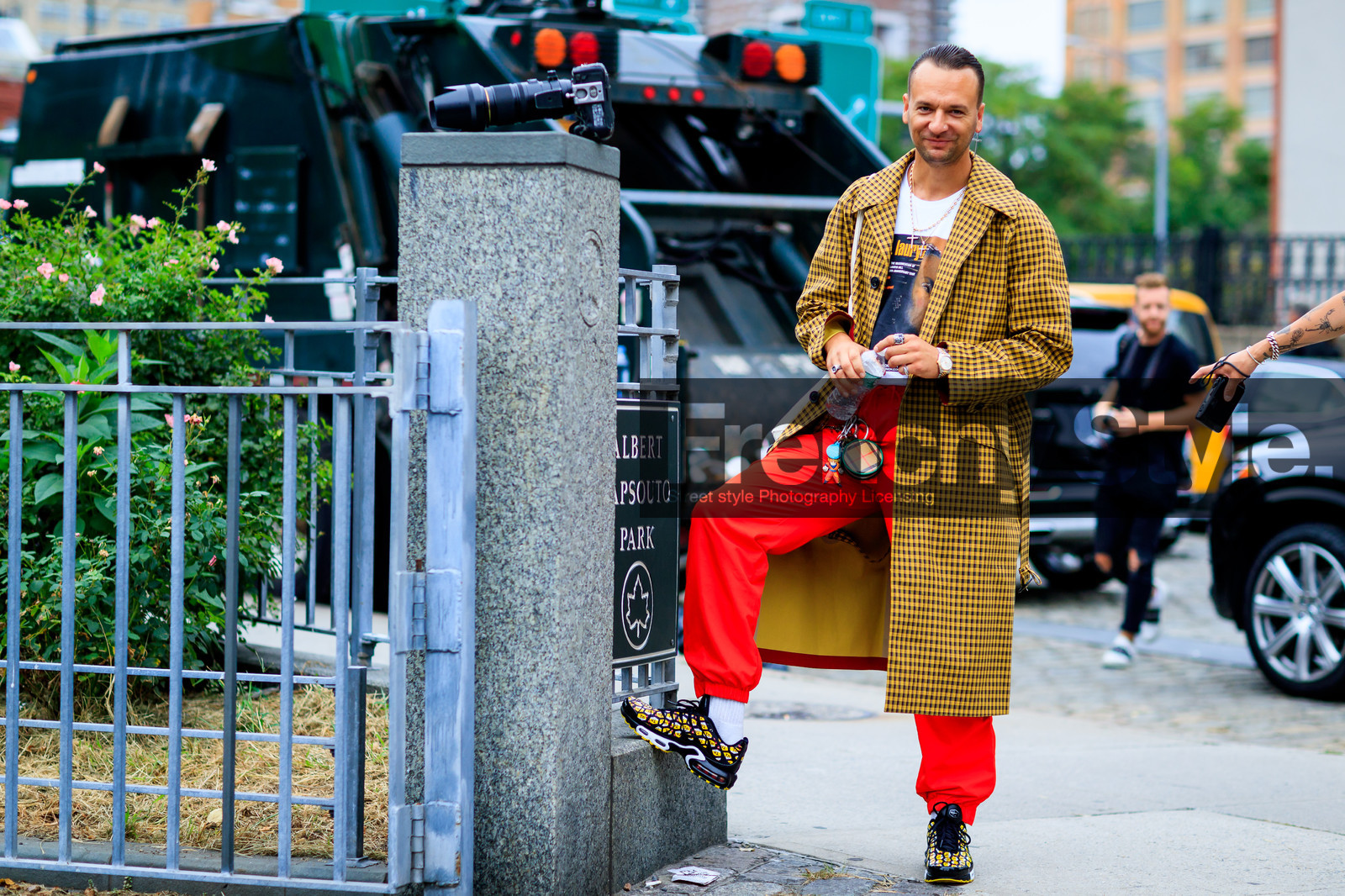 burberry, checked, earrings, graphic jacket, julien boudet, leather shoes, necklace, nike, printed jacket, printed t shirt, red pants, rings, sweatpants, trousers, watch, white t shirt, yellow coat, yellow sneakers, fashion week, frenchystyle, FW, jonathan paciullo, street style, NYFW, NEW YORK, SPRING SUMMER 2019, SS 19, atmosphere details, horizontal, full length