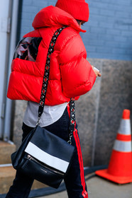 black and white bag, black bag, black denim, denim pants, down jacket, givenchy, graphic bag, graphic jacket, hood, jeans, leather bag, printed bag, printed jacket, red beanie, red jacket, striped pants, trousers, street style, jonathan paciullo, FW, frenchystyle, fashion week, NYFW, NEW YORK, AUTUMN WINTER 2018-2019, AW 18-19, FALL WINTER 2018-2019, FW 18-19, vertical, atmosphere details, detail