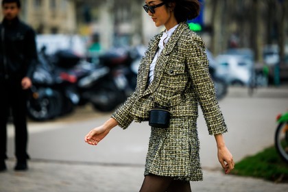 tweed set, chanel, tweed jacket, tweed skirt, mini skirt, yellow jacket, yellow skirt, pleated skirt, cylinder bag, mini bag, chanel bag, crossbody bag, black tights, white top, cropped top, black sunglasses, hair bow, fashion week, frenchystyle, FW, jonathan paciullo, street style, PARIS, PFW, SPRING SUMMER 2022, SS 22, atmosphere details, detail, horizontal, Chriselle Lim