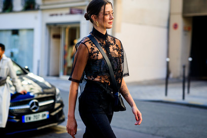 black shirt, black top, black jeans, black leather bag, black total look, freckles, short sleeves shirt, sheer shirt, embroidered shirt, acne studios shirt, acne studios bag, denim, cropped top, strapless top, bra, black bra, crossbody bag, knot details bag, strassed top, strassed bra, golden earrings, hoop earrings, maeva marshall, fashion week, frenchystyle, FW, jonathan paciullo, street style, PFW, PARIS, SPRING SUMMER 2022, SS 22, horizontal, atmosphere details, detail
