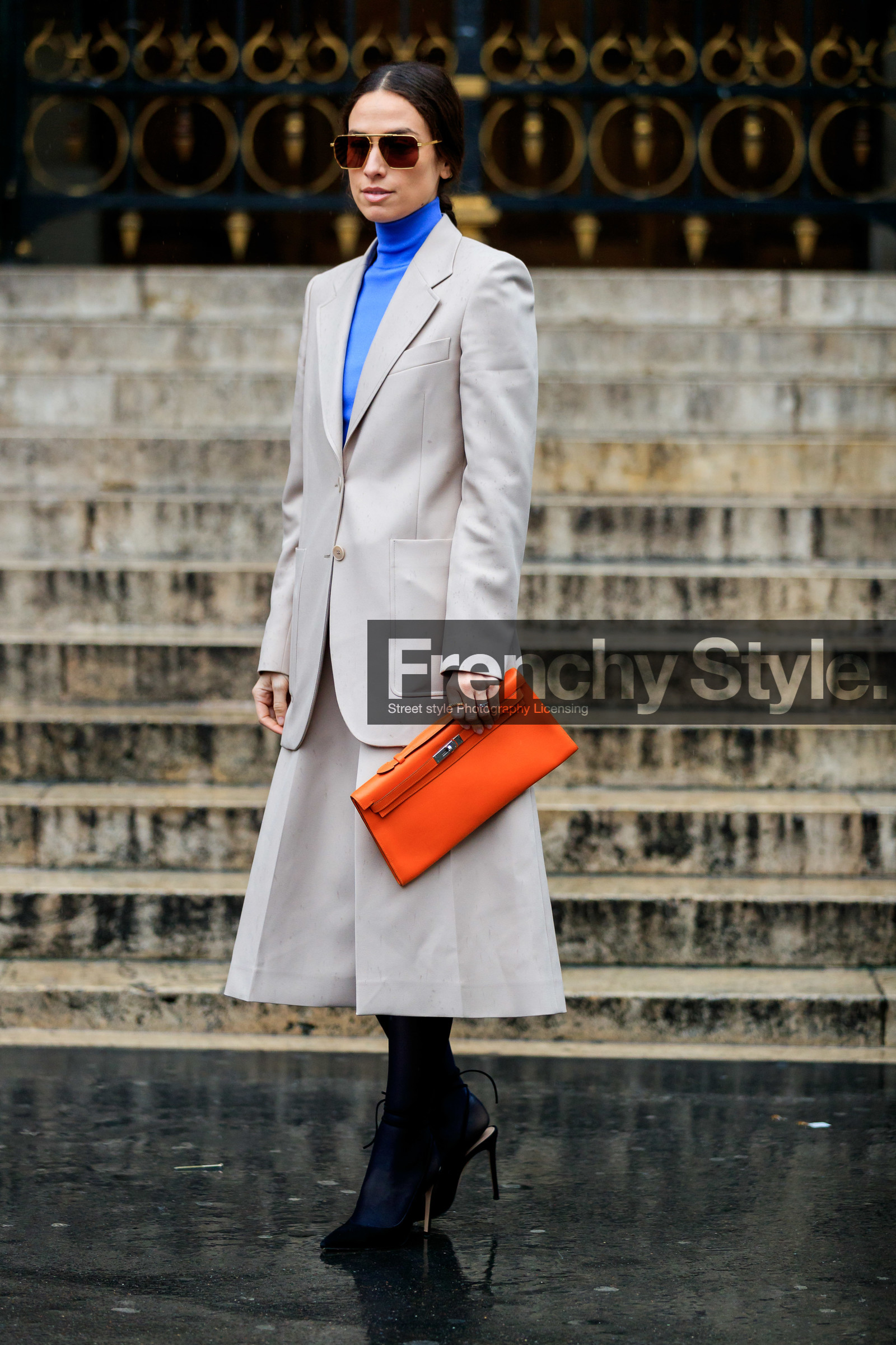 julia restoin roitfeld, erika boldrin, light beige jacket, light beige skirt, orange leather clutch, hermes clutch, bottega veneta sunglasses, metalic frame sunglasses, aviator sunglasses, geometric shape glasses, blue pullover, turtleneck pullover, mid long skirt, split skirt, black tights, black suede shoes, pump, fashion week, frenchystyle, FW, jonathan paciullo, street style, PFW, PARIS, vertical, full length