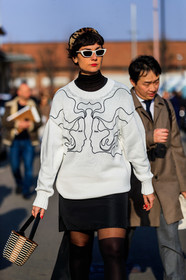 black shoes, black skirt, eva geraldine fontanelli, graphic bag, graphic sweater, headband, leather bag, leather shoes, printed bag, printed sweater, sunglasses, tights, white sweater, fashion week, frenchystyle, FW, jonathan paciullo, street style, MFW, MILAN, AUTUMN WINTER 2019-2020, AW 19-20, FALL WINTER 2019-2020, FW 19-20, vertical, atmosphere details, detail