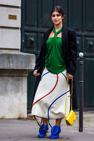 bag, black coat, coat, boots, Dima Al Sheikhly, ecru skirt, electric blue boots, green top, leather boots, loewe look, long skirt, printed skirt, skirt, statement boots, top, yellow bag, street style, jonathan paciullo, FW, frenchystyle, fashion week, PFW, PARIS, SPRING SUMMER 2022, SS 22, vertical, full length