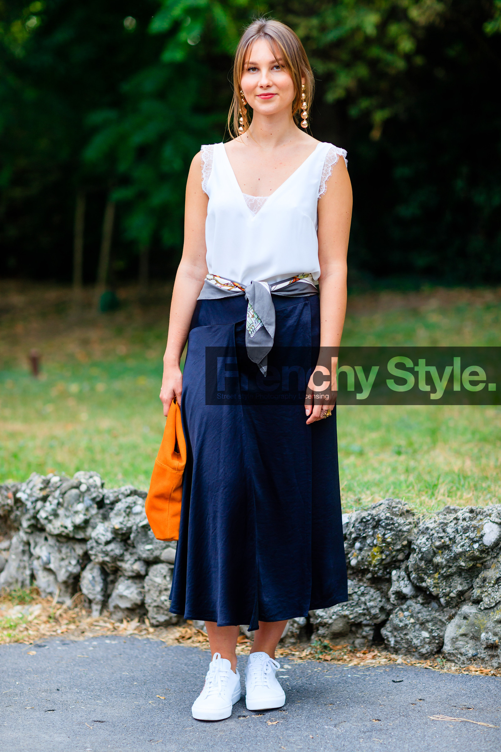 earrings, fashion week, frenchystyle, full length, FW, jonathan paciullo, leather bag, leather shoes, MFW, MILAN, navy skirt, orange bag, scarf, SPRING SUMMER 2017, SS 17, street style, vertical, white sneakers, white top