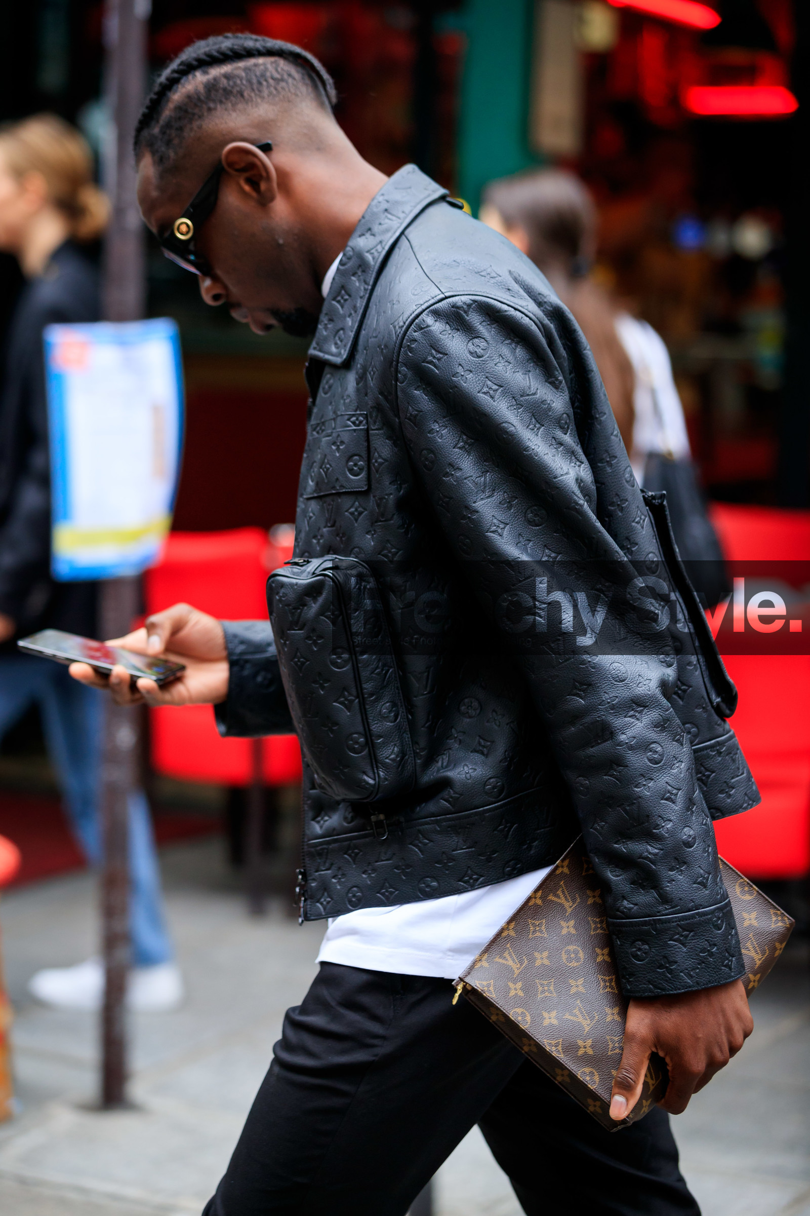 black leather jacket, brown leather clutch, monogrammed jacket, monogrammed clutch, logo all over, logo printed jacket, logo printed clutch, louis vuitton bag, louis vuitton jacket, fashion week, frenchystyle, FW, jonathan paciullo, street style, PFW, PARIS, SPRING SUMMER 2022, SS 22, vertical, atmosphere details, detail