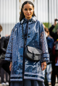 bag, black bag, crossbody bag, dio raincoat, dior bag, dior look, dior print, dots, dots dress, dress, leather bag, logo print, navy skirt, printed skirt, raincoat, rings, transparent raincoat, street style, jonathan paciullo, FW, frenchystyle, fashion week, PFW, PARIS, SPRING SUMMER 2022, SS 22, vertical, atmosphere details