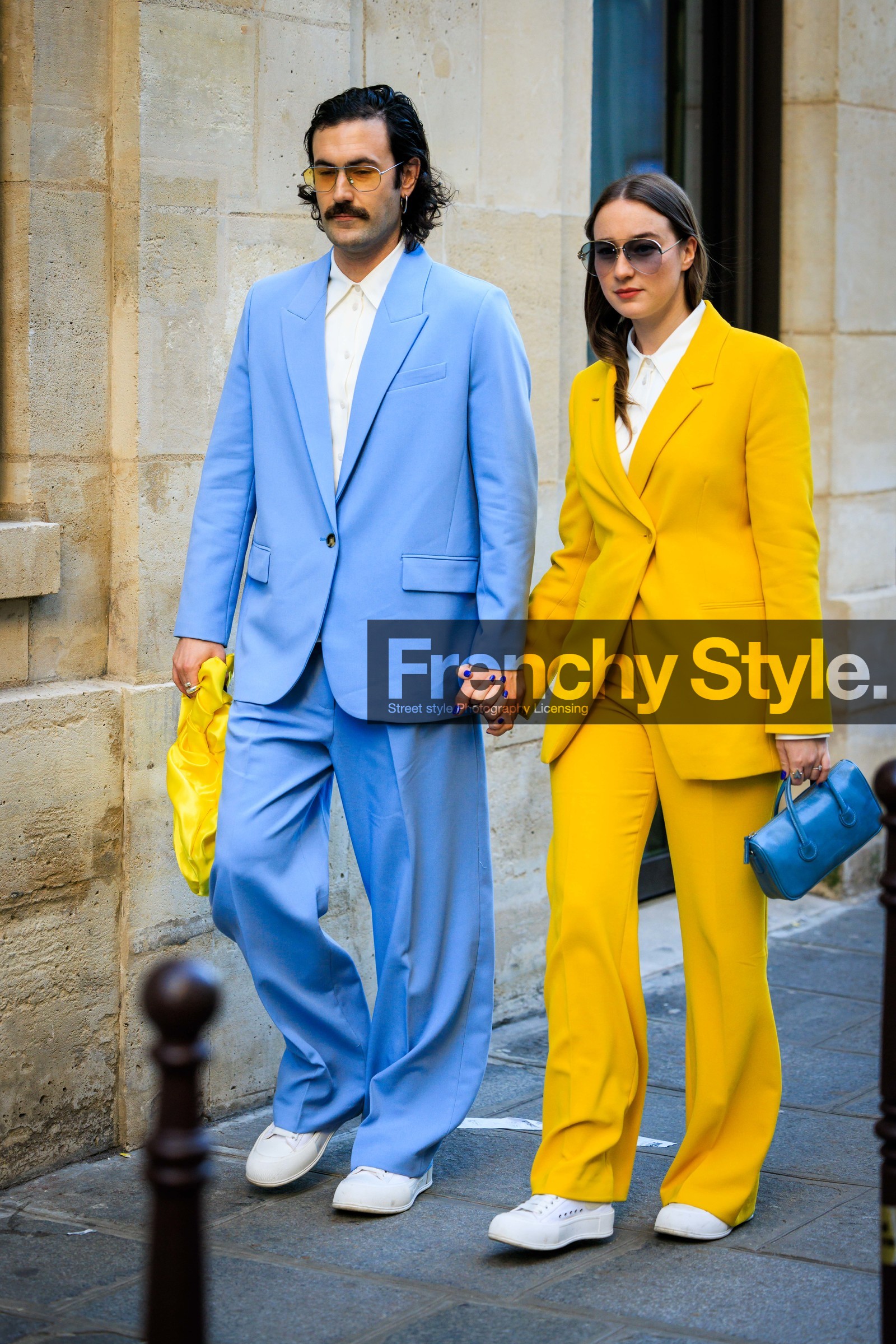 couple matching, blue suit, yellow suit, pilot sunglasses, moustache, dandy style, flared pants, yellow bag, blue mini handbag, young emperors, fashion week, frenchystyle, FW, jonathan paciullo, street style, AUTUMN WINTER 2022-2023, FALL WINTER 2022_2023, FW 22-23, PFW, PARIS, vertical, full length