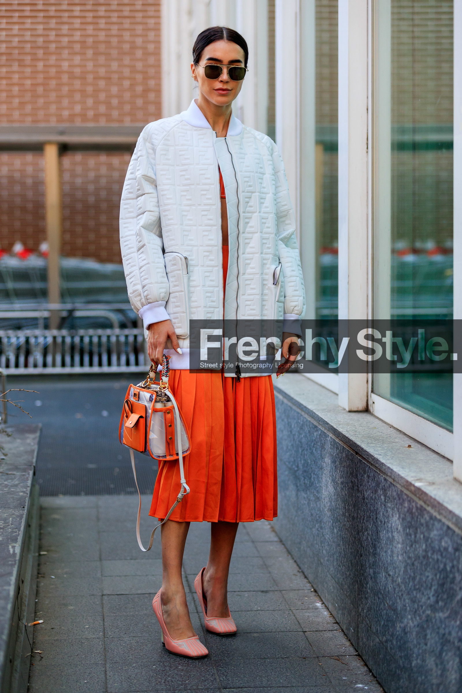 bomber jacket, fendi, graphic bag, high heels, leather bag, leather jacket, leather shoes, monogram, orange bag, pink shoes, pleats, printed bag, red skirt, sunglasses, white jacket, MILAN, MFW, fashion week, frenchystyle, FW, jonathan paciullo, street style, AUTUMN WINTER 2019-2020, AW 19-20, FALL WINTER 2019-2020, FW 19-20, vertical, full length