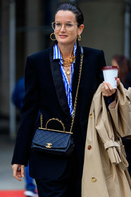 Lucy Chadwick, black jacket, black leather bag, black pants, blue shirt, white shirt, striped shirt, big chain necklace, multi necklace, charms necklace, golden frame glasses, metalic frame sunglasses, aviator glasses, hoop earrings, golden earrings, golden chain strap bag, crossbody bag, chanel bag, quilted bag, beige trench coat, satin jacket, golden necklace, fashion week, frenchystyle, FW, jonathan paciullo, street style, NYFW, NEW YORK, AUTUMN WINTER 2020-2021, FALL WINTER 2020-2021, FW 20-21, vertical, detail, atmosphere details