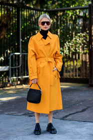 black bag, black shoes, black turtleneck, caro daur, earrings, leather bag, leather shoes, prada, sunglasses, trench coat, yellow coat, MILAN, MFW, fashion week, frenchystyle, FW, jonathan paciullo, street style, AUTUMN WINTER 2019-2020, AW 19-20, FALL WINTER 2019-2020, FW 19-20, vertical, full length