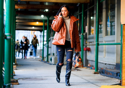 beige sweater, black denim, black shoes, brown bag, brown jacket, checked bag, denim pants, down jacket, graphic bag, high boots, high heels, jeans, leather bag, leather jacket, leather shoes, patchwork, printed bag, ripped pants, studs, trousers, zip, street style, jonathan paciullo, FW, frenchystyle, fashion week, NYFW, NEW YORK, AUTUMN WINTER 2018-2019, AW 18-19, FALL WINTER 2018-2019, FW 18-19, atmosphere details, horizontal, full length, Tiffany Hsu