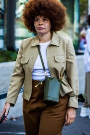 afro hairstyle, bag, beige jacket, brown pants, crossbody bag, freckles, hairstyle, jacket, khaki bag, large pants, leather bag, Odile Gautreau, pants, ribbed top, white top, natural makeup, fashion week, frenchystyle, FW, jonathan paciullo, street style, PFW, PARIS, SPRING SUMMER 2022, SS 22, vertical, atmosphere details