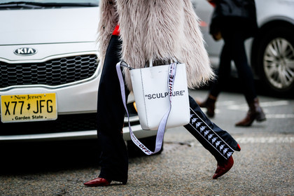 black pants, Fur coat, graphic bag, graphic pants, high heels, leather bag, leather shoes, off white, printed bag, printed pants, red boots, trousers, white bag, white coat, white fur, street style, jonathan paciullo, FW, frenchystyle, fashion week, NYFW, NEW YORK, AUTUMN WINTER 2018-2019, AW 18-19, FALL WINTER 2018-2019, FW 18-19, atmosphere details, horizontal, detail
