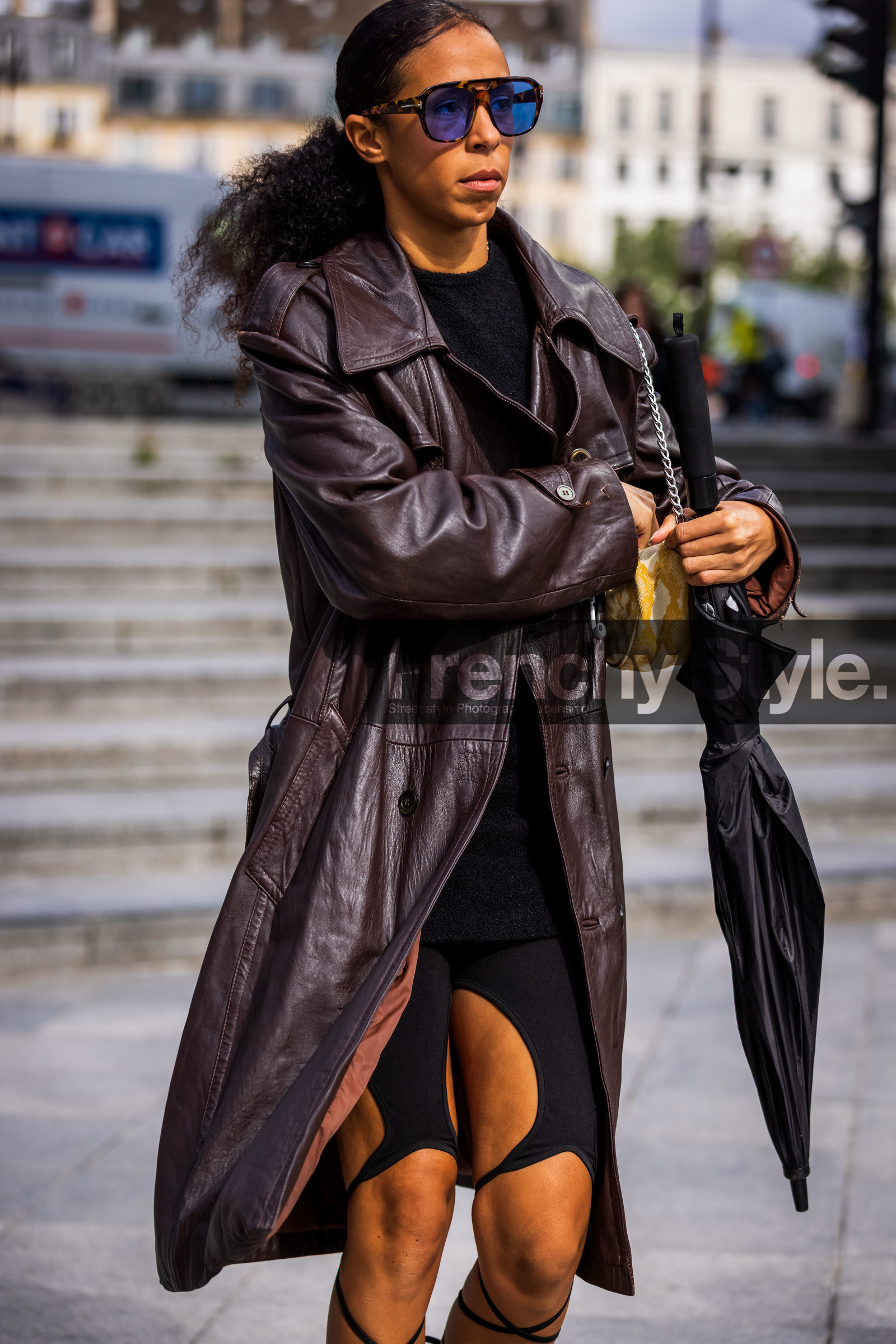aviator sunglasses, biker short, black knitwear, black short, burgundy coat, coat, leather coat, sunglasses, umbrella, yellow bag, fashion week, frenchystyle, FW, jonathan paciullo, street style, PFW, PARIS, SPRING SUMMER 2022, SS 22, vertical, atmosphere details