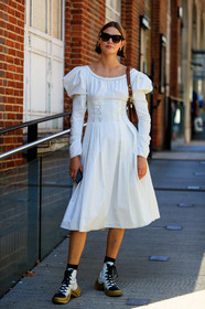victoria sekrier, white dress, mid long dress, balloon sleeves, brown scale sunglasses, celine sunglasses, hoop earrings, golden earrings, long sleeves dress, brown leather bag, louis vuitton boots, louis vuitton sneakers, high sneakers, laced shoes, white leather shoes, white leather sneakers, golden sole, fashion week, frenchystyle, FW, jonathan paciullo, street style, vertical, full length
