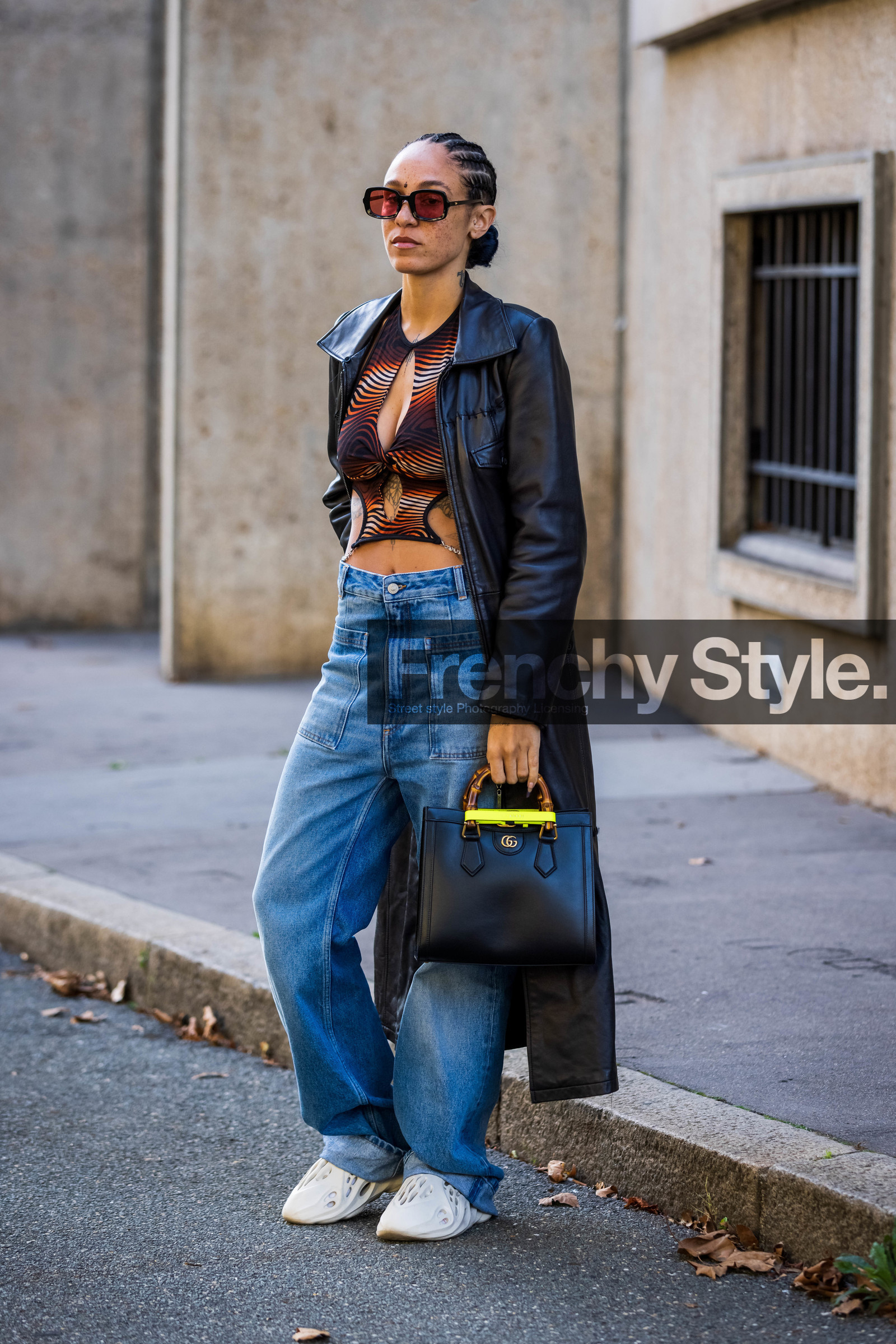bag, baggy jean, black bag, black coat, blue jean, brown crop top, brown top, coat, crop top, cut out top, denim, gucci bag, Hera Pradel, jean, leather coat, orange top, printed crop top, printed top, sneakers, sunglasses, white sneakers, street style, jonathan paciullo, FW, frenchystyle, fashion week, PFW, PARIS, SPRING SUMMER 2022, SS 22, vertical, full length