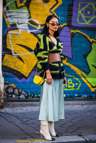 bag, belt, bicolor boots, black knitwear, boots, brown sunglasses, camel belt, cardigan, color, knitwear, large belt, leather bag, leather belt, pastel blue skirt, Pornwika Spiecker, print, printed knitwear, satin skirt, sunglasses, white boots, yellow bag, yellow knitwear, street style, jonathan paciullo, FW, frenchystyle, fashion week, PFW, PARIS, SPRING SUMMER 2022, SS 22, vertical, atmosphere details