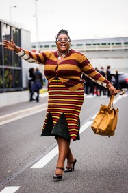 bag, black sandals, burgundy cardigan, cardigan, color, Gabriella Karefa Johnson, leather bag, necklace, oversize bag, red skirt, sandals, skirt, striped cardigan, striped skirt, stripes, sunglasses, yellow bag, yellow cardigan, yellow skirt, PARIS, PFW, fashion week, frenchystyle, FW, jonathan paciullo, street style, SPRING SUMMER 2022, SS 22, vertical, full length