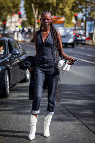 afro braid, bag, boots, braid, corsert, denim, denim jumpsuit, grey denim, grey jean, grey jumpsuit, hairstyle, jumpsuit, leather boots, round sunglasses, santiags, Shanelle Nyasiase, sunglasses, white bag, white boots, white santiags, zipped jumpsuit, street style, jonathan paciullo, FW, frenchystyle, fashion week, PFW, PARIS, SPRING SUMMER 2022, SS 22, vertical, full length, model