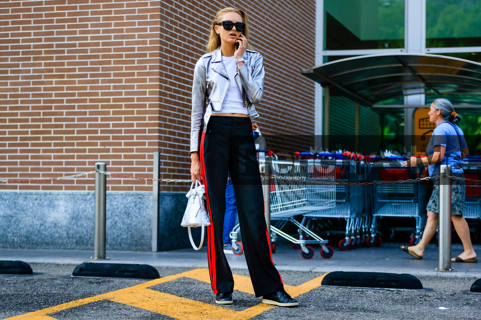 atmosphere details, black pants, black sneakers, fashion week, frenchystyle, full length, FW, grey jacket, horizontal, jonathan paciullo, leather jacket, leather perfecto, metallic jacket, MFW, MILAN, model, romee strijd, silver jacket, SPRING SUMMER 2017, SS 17, street style, striped pants, sunglasses, trousers, white bag, white t shirt