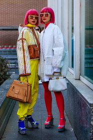 Ami and Aya Suzuki, blue socks, camel bag, dyed hair, fendi, graphic jacket, high heels, hood, leather bag, leather shoes, monogram, pink hair, printed jacket, shiny shoes, silver shoes, sunglasses, tights, transparent jacket, trousers, white bag, white jacket, yellow pants, MILAN, MFW, fashion week, frenchystyle, FW, jonathan paciullo, street style, AUTUMN WINTER 2019-2020, AW 19-20, FALL WINTER 2019-2020, FW 19-20, vertical, atmosphere details, detail