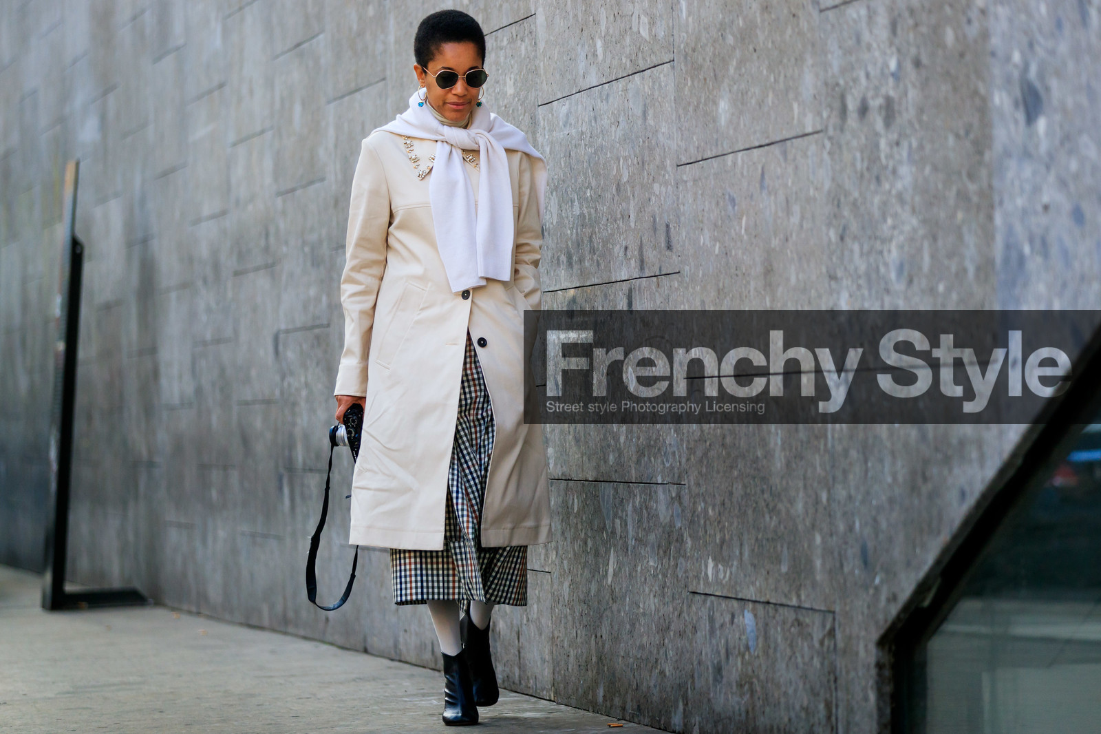 black and white, black shoes, checked, gingham, graphic skirt, leather shoes, plaid, printed skirt, sunglasses, tamu mcpherson, tied up sweater, white coat, white sweater, fashion week, frenchystyle, FW, jonathan paciullo, street style, MFW, MILAN, AUTUMN WINTER 2019-2020, AW 19-20, FALL WINTER 2019-2020, FW 19-20, atmosphere details, full length, horizontal