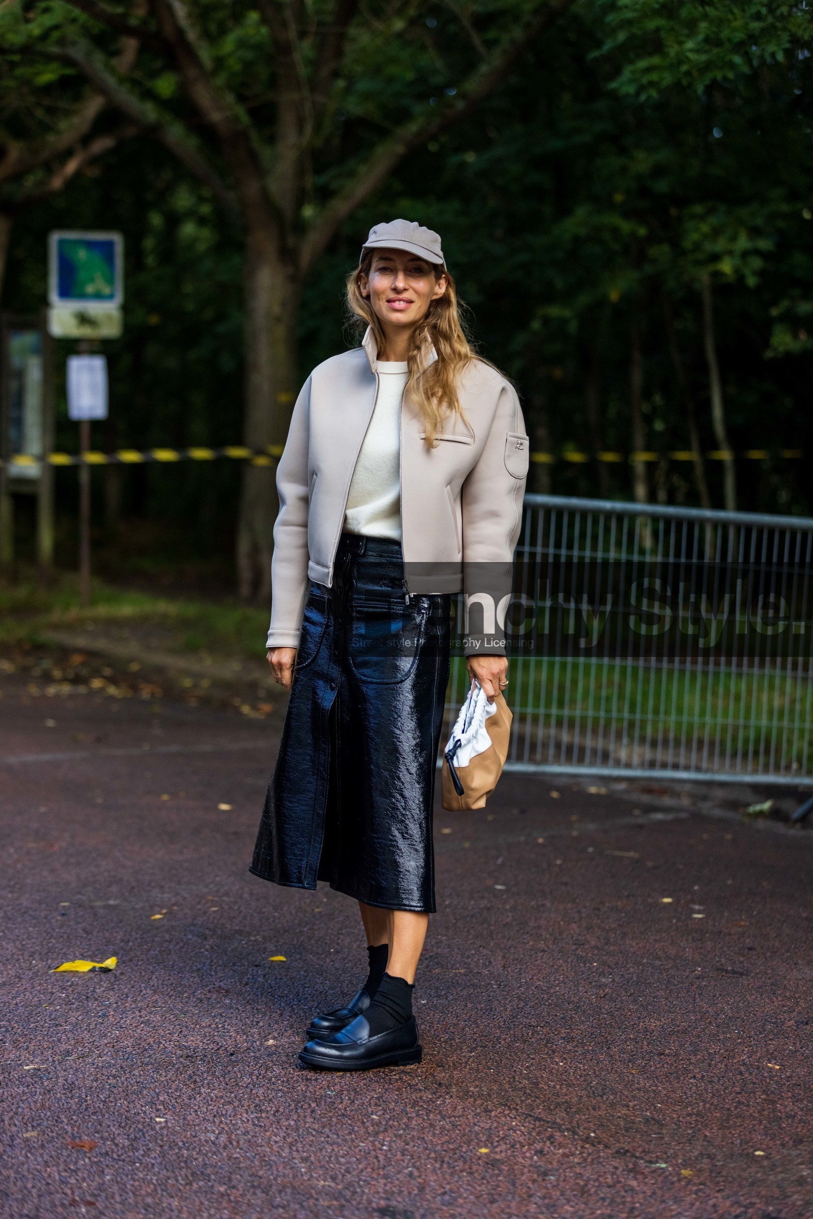 Alexandra Golovanoff, bicolor bag, bicolor pouch, black loafers, black mocassins, black skirt, black socks, camel pouch, cap, courreges jacket, grey cap, grey jacket, jacket, leather pouch, leather skirt, loafers, long skirt, mocassins, patent skirt, pouch, skirt, white jumper, white knitwear, white pouch, street style, jonathan paciullo, FW, frenchystyle, fashion week, PFW, PARIS, SPRING SUMMER 2022, SS 22, vertical, full length