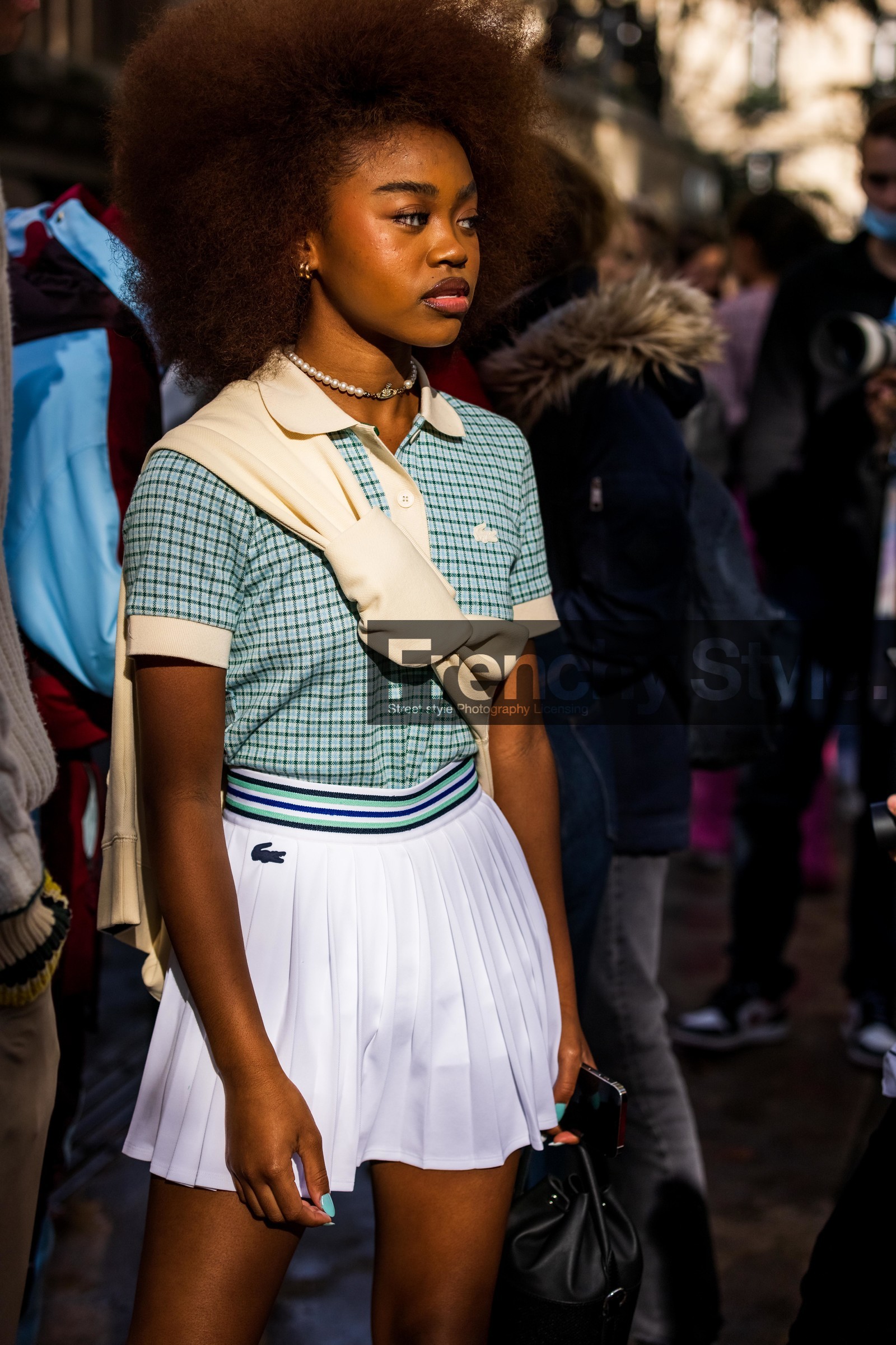 check, checked polo, green polo, Kayliah Balou, lacoste look, mini skirt, pleated skirt, polo, print, printed polo, skirt, tennis look, white skirt, lacoste, fashion week, frenchystyle, FW, jonathan paciullo, street style, PFW, PARIS, SPRING SUMMER 2022, SS 22, vertical, atmosphere details
