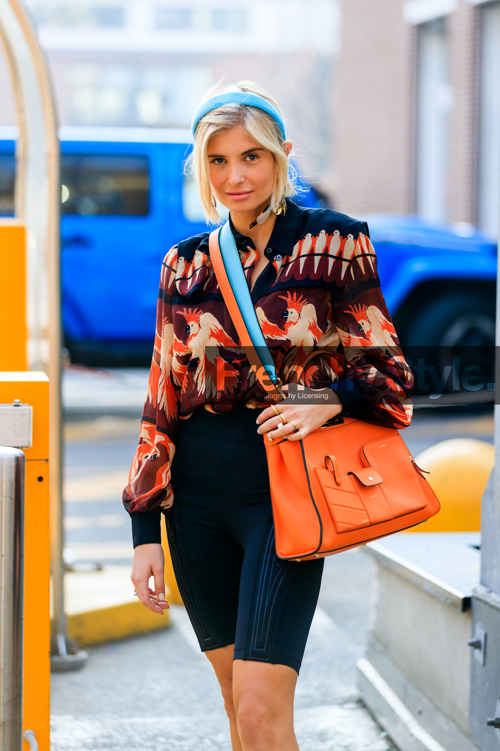 black shirt, black shorts, fendi, graphic jacket, headband, leather bag, orange bag, printed jacket, printed shirt, red shirt, xenia adonts, MILAN, MFW, fashion week, frenchystyle, FW, jonathan paciullo, street style, AUTUMN WINTER 2019-2020, AW 19-20, FALL WINTER 2019-2020, FW 19-20, vertical, atmosphere details, detail