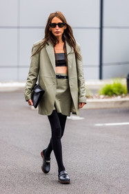 black bra, black pouch, black sabots, black sunglasses, black tights, blazer, bra, Chloé Harrouche, clogs, khaki blazer, khaki skirt, leather bra, leather pouch, leather sabots, pouch, sabots, shirt skirt, skirt, sunglasses, tights, PARIS, PFW, fashion week, frenchystyle, FW, jonathan paciullo, street style, SPRING SUMMER 2022, SS 22, vertical, full length