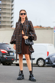madelynn furlong, checked shirt, checked jacket, black jacket, red jacket, red shirt, black shirt, long shirt, long sleeves shirt, prada bag, shoulder bag, black leather bag, prada sunglasses, prada shoes, brown skirt, pleated skirt, black polish shoes, laced shoes, big sole shoes, black socks, fashion week, frenchystyle, FW, jonathan paciullo, street style, MFW, MILAN, SPRING SUMMER 2020, SS 20