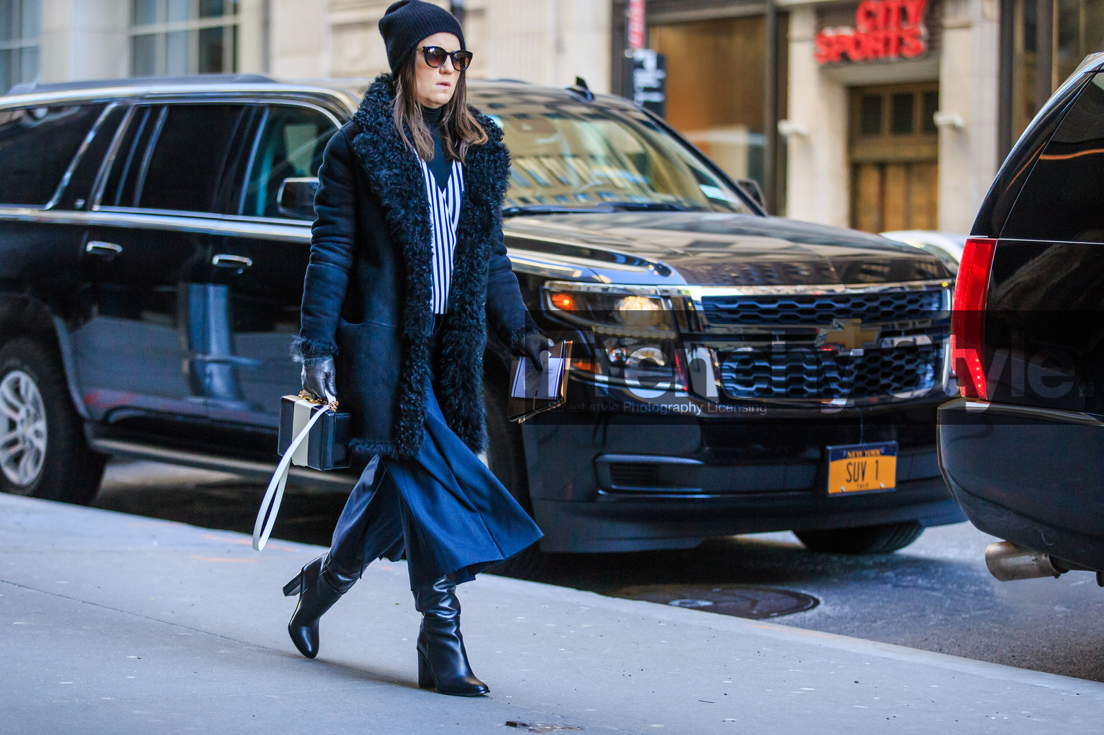 atmosphere details, AUTUMN WINTER 2016-2017, AW 16-17, black and white, black beanie, black boots, black coat, black fur, blue pants, fashion week, frenchystyle, full length, fur collar, fur jacket, FW, FW 16-17, high boots, high heels, horizontal, jonathan paciullo, leather bag, leather boots, leather jacket, mini bag, NEW YORK, NYFW, shearling, sheep fur, street style, striped top, suitcase, sunglasses, trousers, wide pants, woman