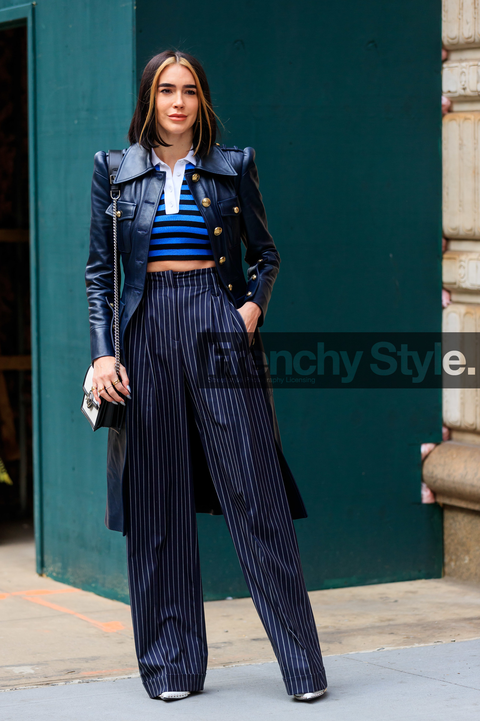brittany xavier, michael kors jacket, michael kors jacket, michael kors look, navy blue leather jacket, navy blue pants, navy blue pullover, long jacket, striped pants, striped pullover, blue pullover, cropped pullover, high waist pants, carrot pants, polo collar pullover, golden button, multi button jacket, shoulder bag, silvered chain strap bag, black leather bag, white bag, loose pants, fashion week, frenchystyle, FW, jonathan paciullo, street style, NYFW, NEW YORK, AUTUMN WINTER 2020-2021, FALL WINTER 2020-2021, FW 20-21, vertical, full length