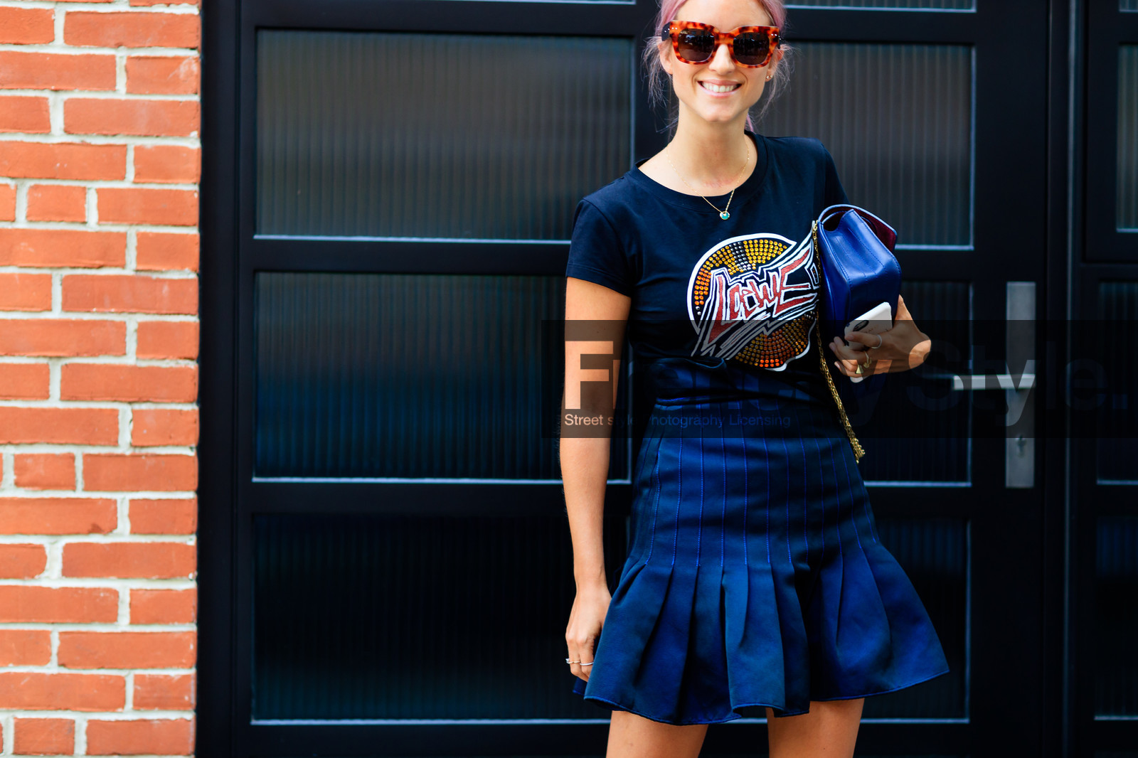 atmosphere details, black t shirt, blue bag, Charlotte Groeneveld, detail, dyed hair, fashion week, frenchystyle, FW, green shoes, high heels, high waist, horizontal, jonathan paciullo, leather bag, loewe, navy skirt, NEW YORK, NYFW, pink hair, pleated skirt, printed t shirt, SPRING SUMMER 2017, SS 17, street style, sunglasses, woman