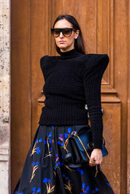 bag; balenciaga looks; balenciaga pumps; black bag; black knitwear; black skirt; floral print; flower; knitwear; leather bag; ovesize shoulder; pleated skirt; printed skirt; skirt; sunglasses