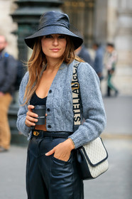 carlotta rubaltelli, black hat, tulle hat, leather hat, black leather pants, black leather belt, black bra, grey cardigan, cropped top, stella mccartney bag, logo strap bag, white bag, monogrammed bag, dior belt, high waist pants, PARIS, PFW, SPRING SUMMER 2020, SS 20, fashion week, frenchystyle, FW, jonathan paciullo, street style, vertical, atmosphere details, detail