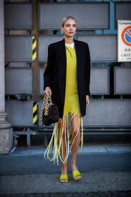black jacket, yellow dress, light green dress, white dress, fringe dress, mid long dress, asymetrical dress, suede bag, plaited bag, big chain strap bag, golden chain strap bag, golden earrings, hoop earrings, chain earrings, light green slippers, light green sandals, bottega veneta bag, leonie hanne, street style, jonathan paciullo, FW, frenchystyle, fashion week, MFW, MILAN, SPRING SUMMER 2021, SS 21, vertical, full length