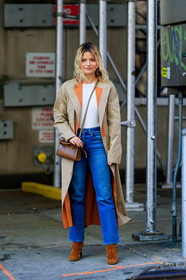 sabina socol, beige trench coat, camel suede boots, brown leather bag, crossbody bag, tory burch bag, blue jeans, cropped jeans, flare jeans, white top, orange trench coat, fashion week, frenchystyle, FW, jonathan paciullo, street style, FALL WINTER 2020-2021, AUTUMN WINTER 2020-2021, FW 20-21, vertical, full length, NYFW, NEW YORK