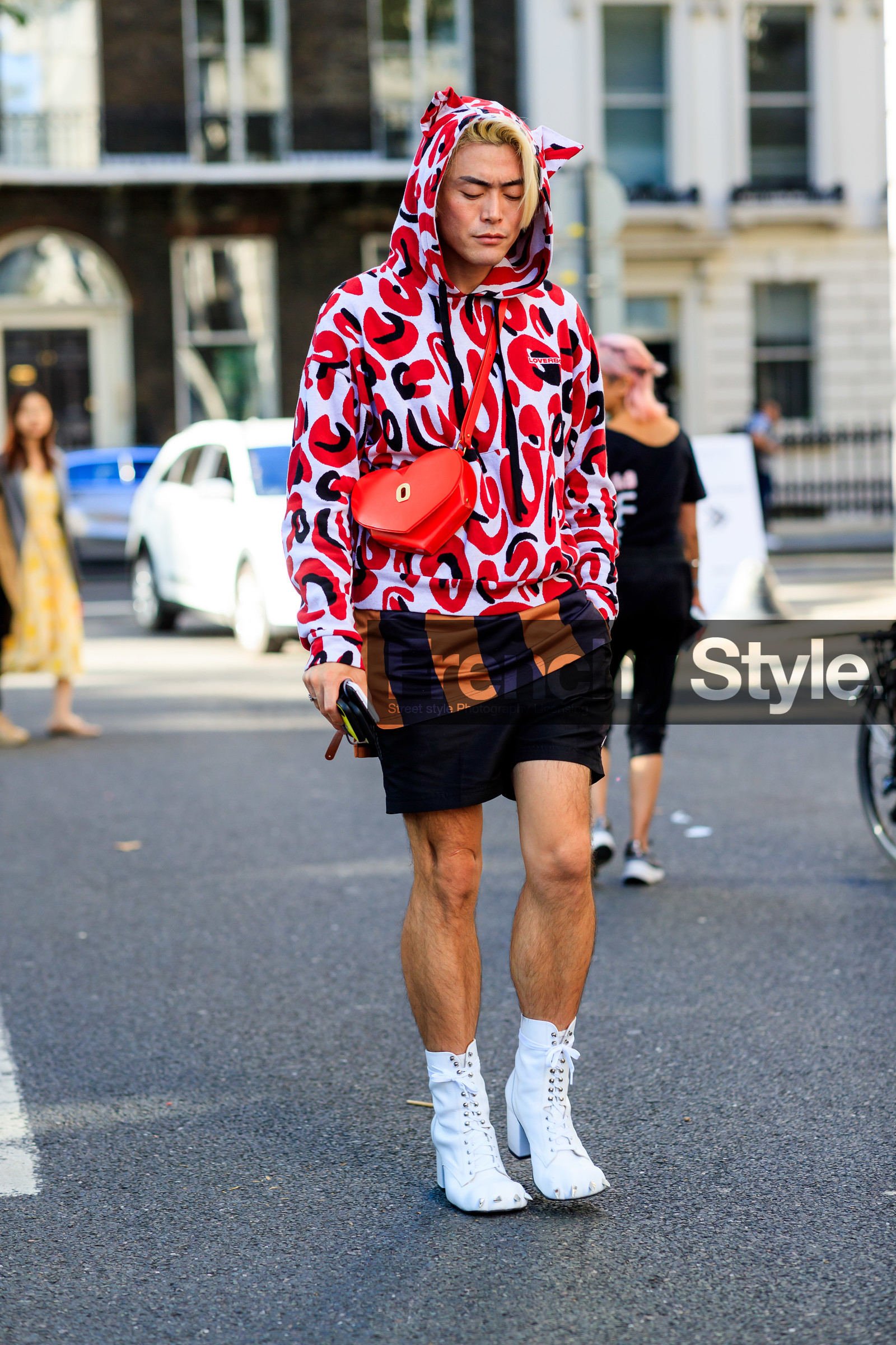 sportswear, animal print sweat shirt, hoodie, crossbody bag, red leather bag, heart shape bag, black bermuda shorts, laced boots, white leather boots, studs boots, heels shoes, striped top, charles jeffrey loverboy pull, charles jeffrey loverboy shoes, fashion week, frenchystyle, FW, jonathan paciullo, street style, vertical, full length