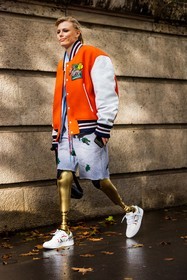 bag, beltbag, black bag, bomber, color, grey shorts, jogging, lacoste look, Lauren Wasser, orange bomber, shorts, sneakers, stripes, white sneakers, lacoste, fashion week, frenchystyle, FW, jonathan paciullo, street style, PFW, PARIS, SPRING SUMMER 2022, SS 22, vertical, full length