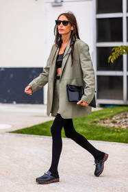 black bra, black pouch, black sabots, black sunglasses, black tights, blazer, bra, Chloé Harrouche, clogs, khaki blazer, khaki skirt, leather bra, leather pouch, leather sabots, pouch, sabots, shirt skirt, skirt, sunglasses, tights, PARIS, PFW, fashion week, frenchystyle, FW, jonathan paciullo, street style, SPRING SUMMER 2022, SS 22, vertical, full length
